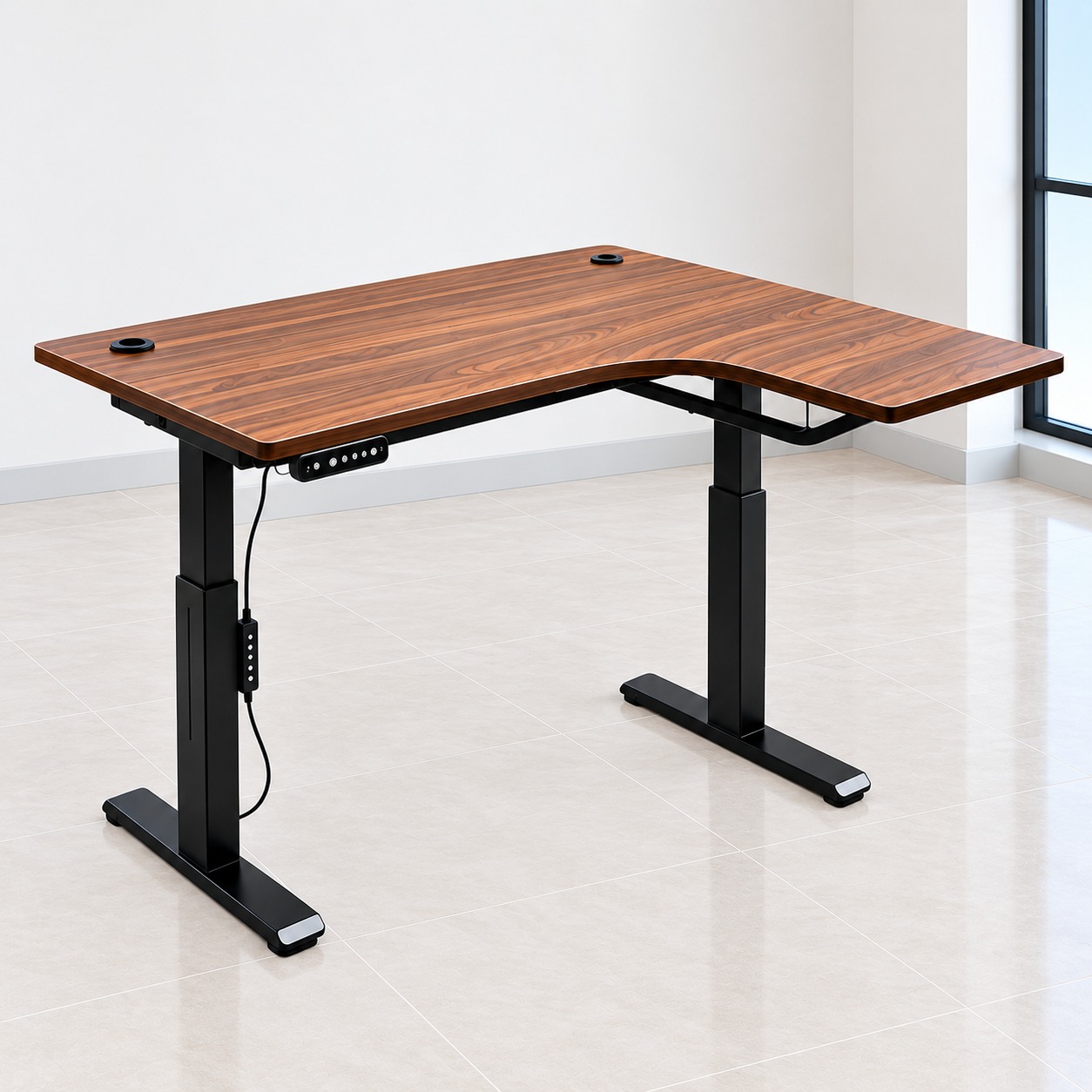 Electric L-shaped standing desk with black adjustable frame and cable grommets