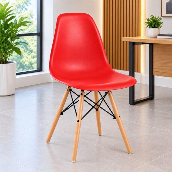 Red Eames plastic chair with wooden legs