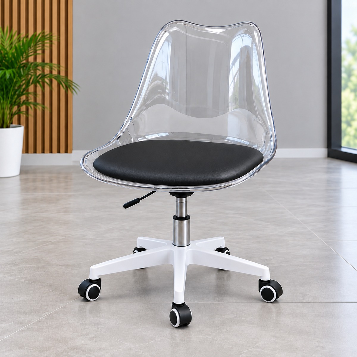 Transparent acrylic office chair with black padded seat in modern workspace